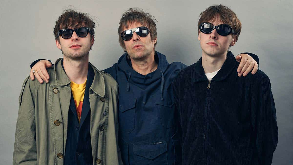 Liam Gallagher with Lennon and Gene