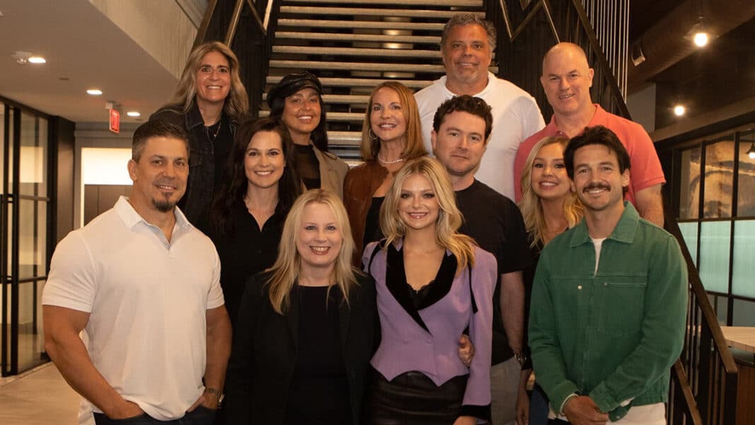 Carter Faith with the Universal Music Group Nashville team