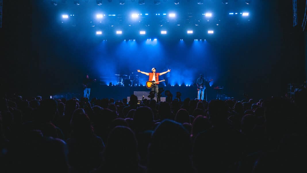Russell Dickerson performing on the RussellMania tour