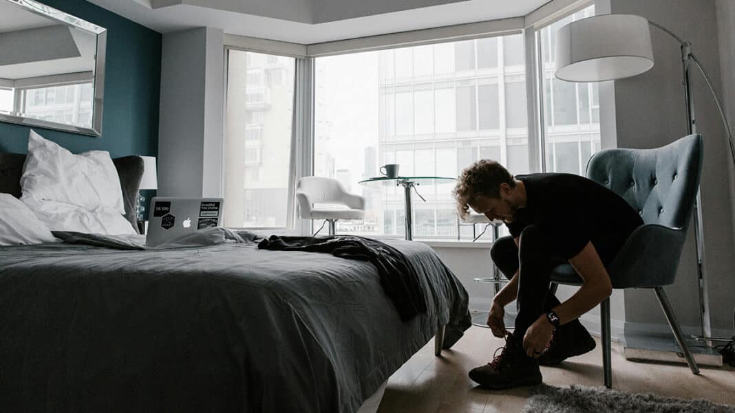 Man tying his shoelaces